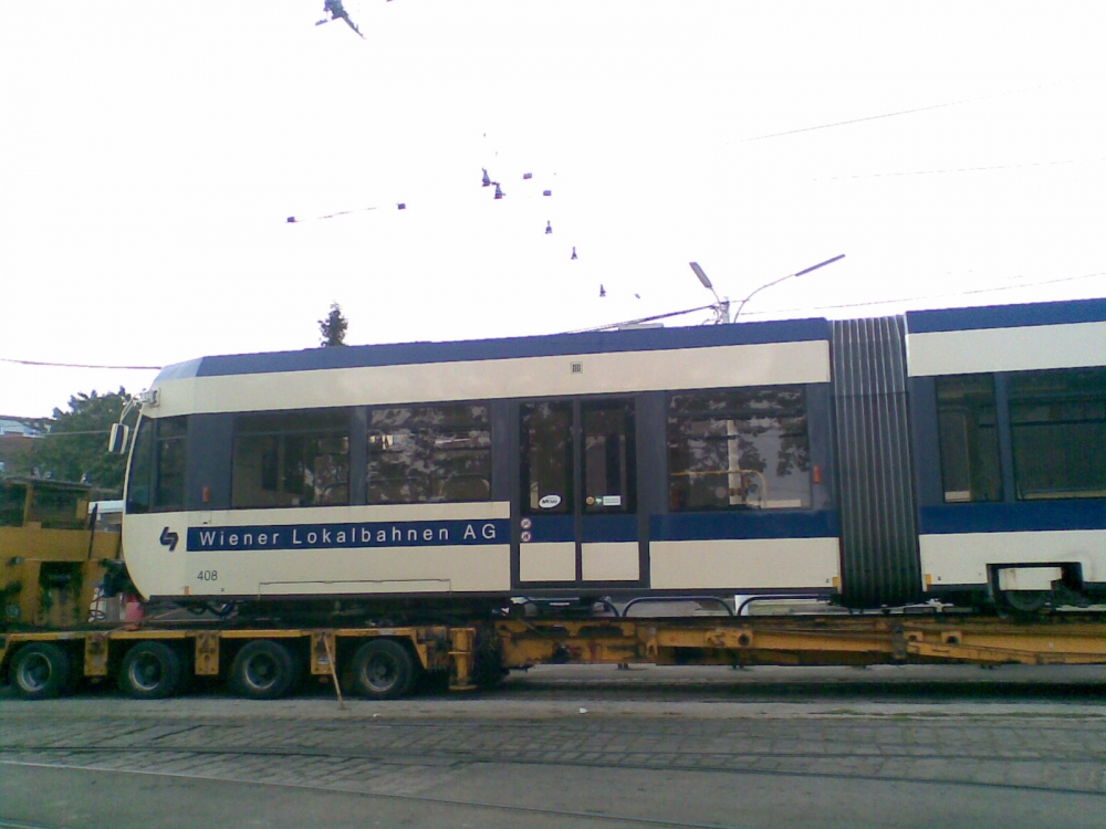 WLB TW 408 auf Tieflader in der wolfganggasse 6